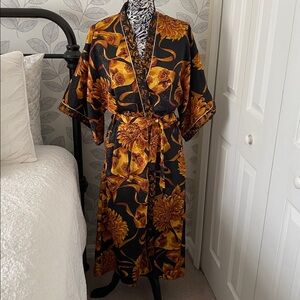 Vintage 90’s black and gold floral and bow robe by Circa 2000